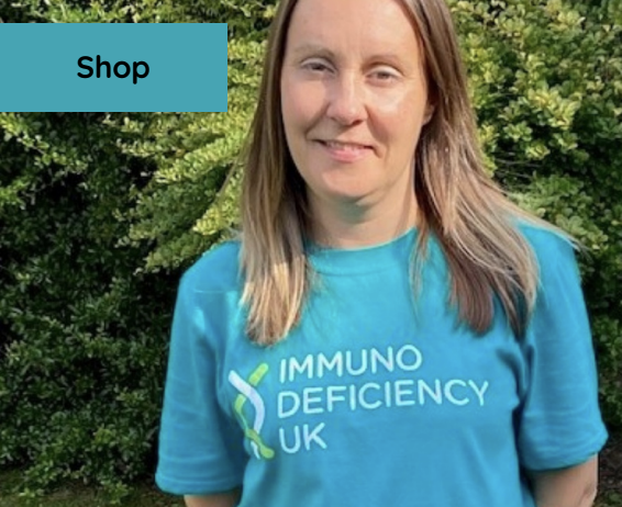 Blonde woman wearing immunodeficiency uk t-shirt