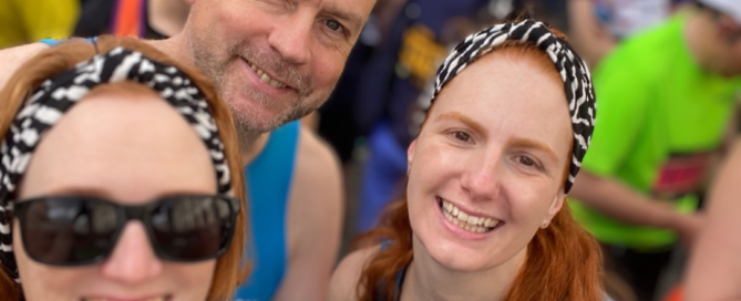 smiling runners after completing half marathon